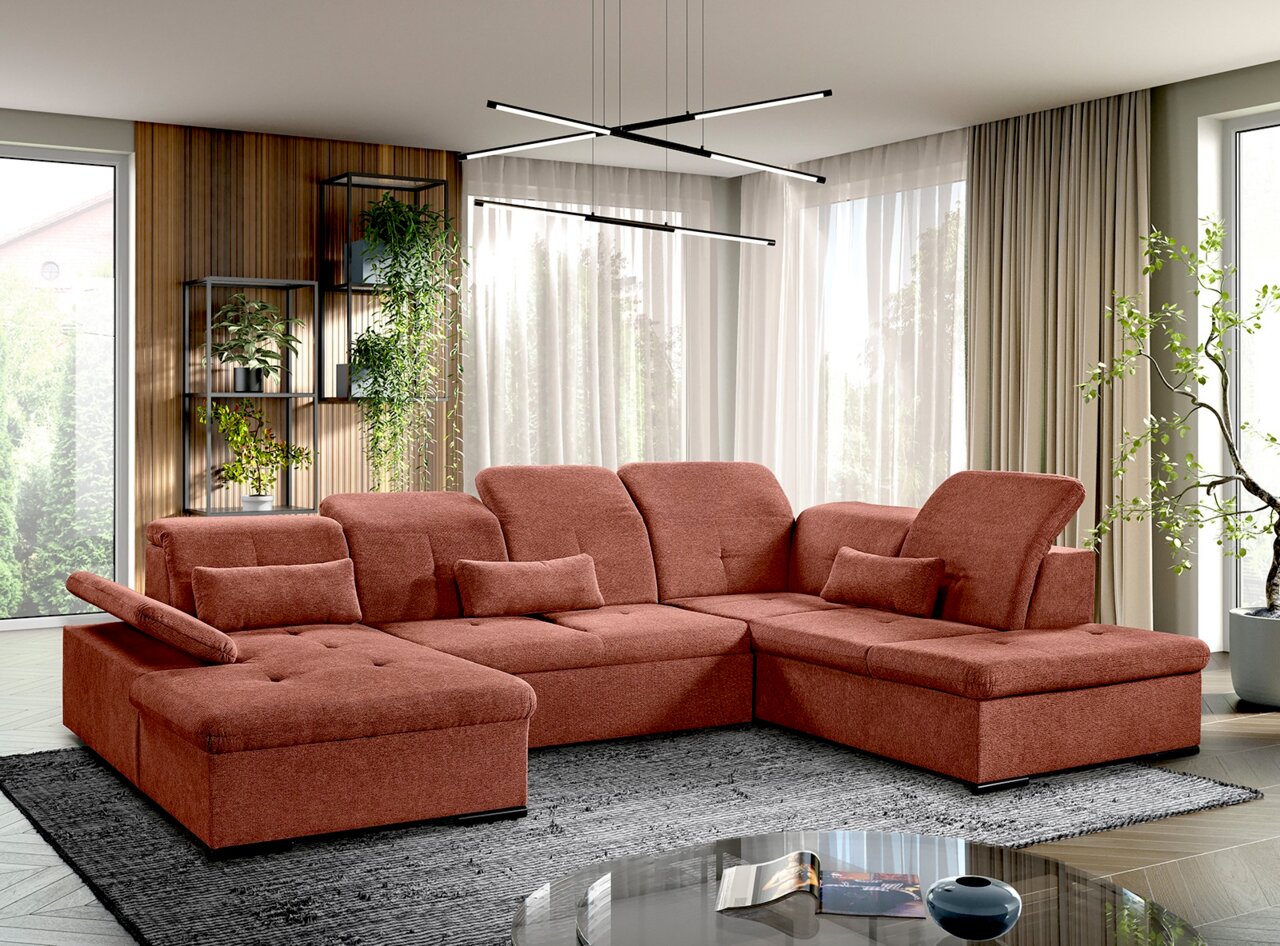 Rote Ecksofa in einem modernen Wohnzimmer, fotografiert aus einer leicht erhöhten Perspektive.