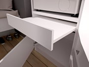 Nahaufnahme einer weißen Schublade in einem modernen Schrank, leicht schräg von vorne/oben fotografiert, Schublade geöffnet und Innenraum sichtbar