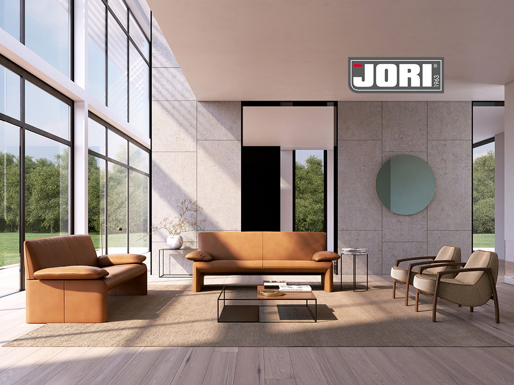 Elegantes JORI-Wohnzimmer mit Ledersofas.