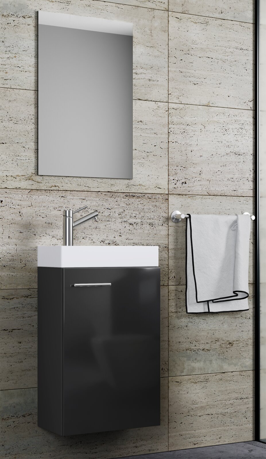 Modernes Badmöbel-Set mit rechteckigem Spiegel, weißem Aufsatzwaschbecken und schwarzem Waschtischunterschrank mit Chromarmatur, seitliche Frontansicht an heller Steinfliesenwand