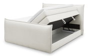 Boxspringbett mit geöffnetem Stauraum, seitliche Perspektive