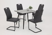 Vier graue Schwingstühle um einen quadratischen Tisch mit schwarzem Gestell, seitliche Perspektive.