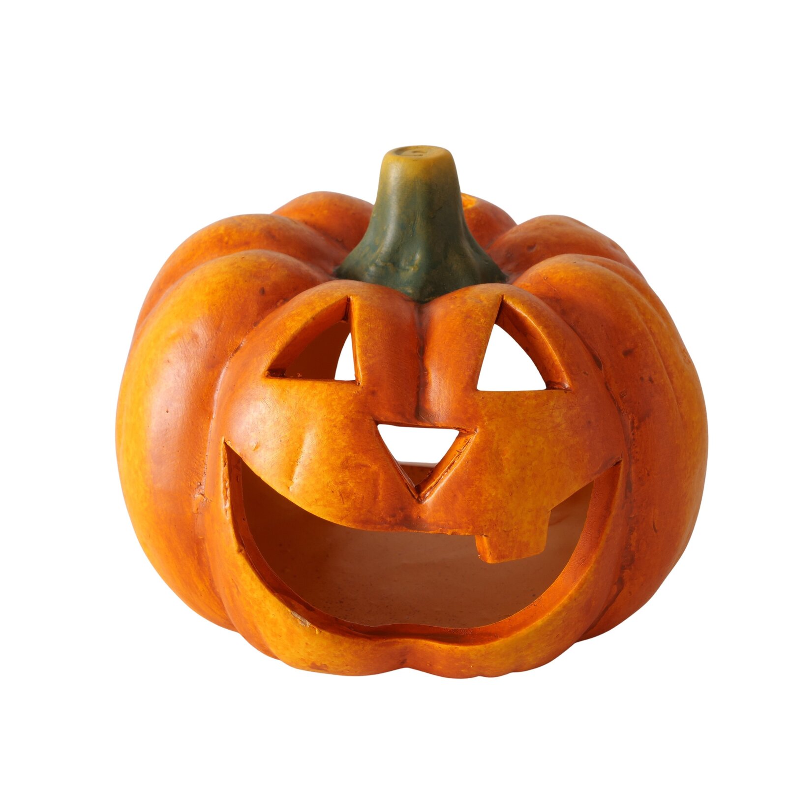 Teelichthalter in Form eines Kürbisses mit geschnitztem Gesicht, frontal betrachtet.