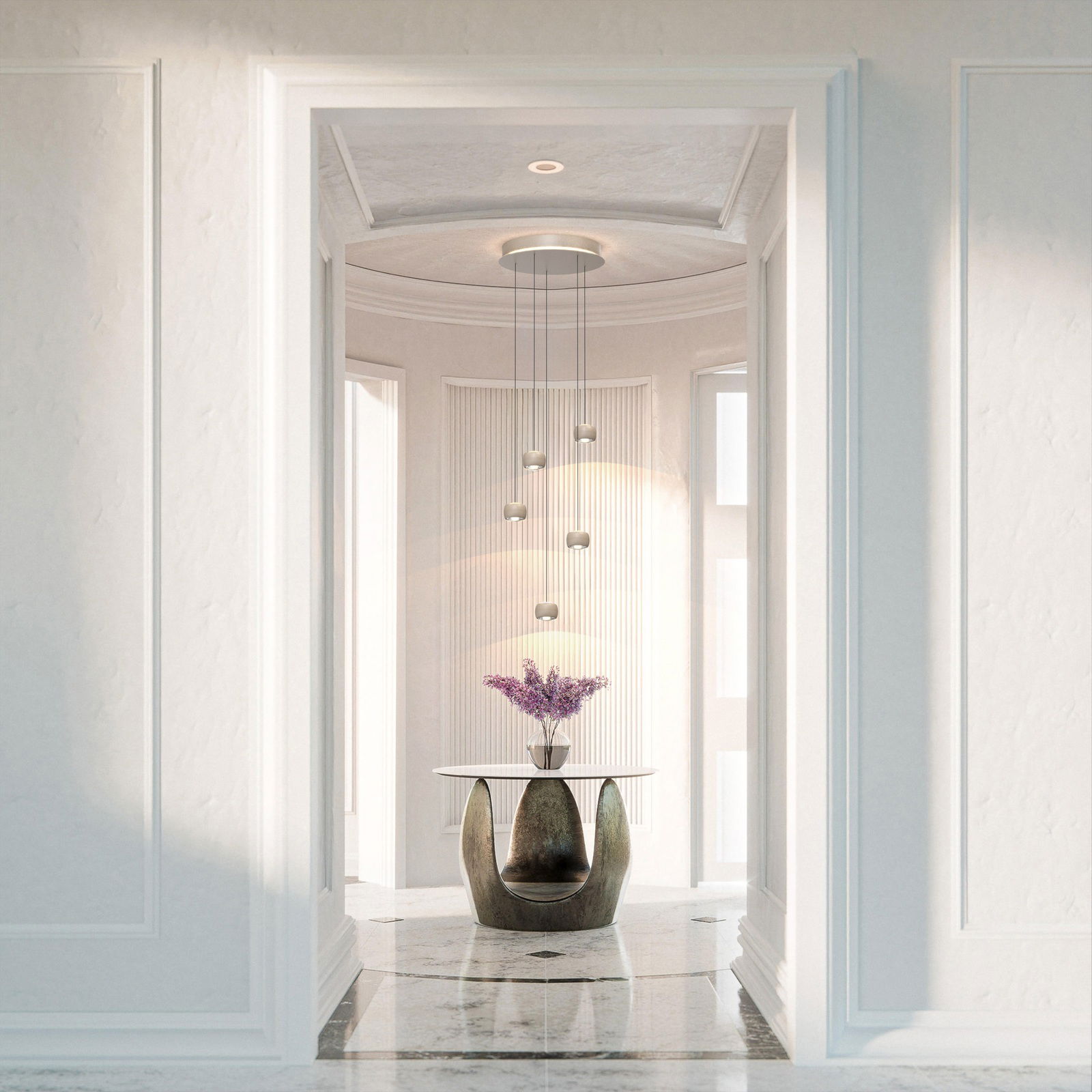 Moderne LED-Pendelleuchte in einem eleganten Raum, von vorne betrachtet, mit mehreren hängenden Lichtelementen über einem Tisch mit Blumen.