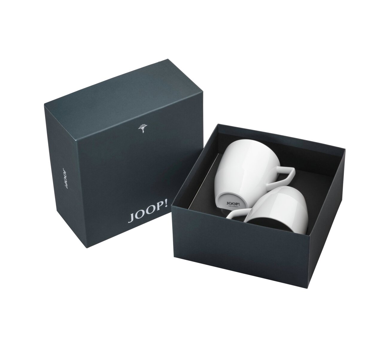 JOOP! Becher 2er-Set DINING GLAMOUR Zwei weiße Tassen mit Henkel in einer offenen, dunkelgrünen Geschenkbox mit dem Logo 'JOOP!' auf der Vorderseite, aus der Vogelperspektive fotografiert.