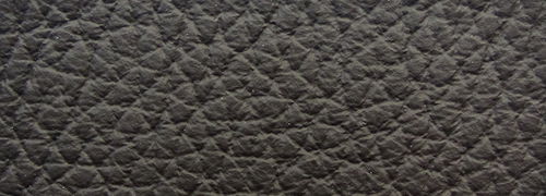 Bacher Sessel KAMA Nahaufnahme der schwarzen Lederstruktur eines Sessels