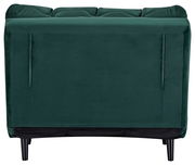 Rückansicht eines grünen Funktionssessels mit schwarzen Beinen.