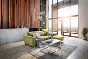 Moderne groene hoekbank TIM in een stijlvolle woonkamer met grote ramen en houten lambrisering, zijaanzicht.
