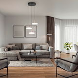 Moderne Pendelleuchte mit drei runden Lampenschirmen in einem stilvollen Wohnzimmer, seitliche Perspektive
