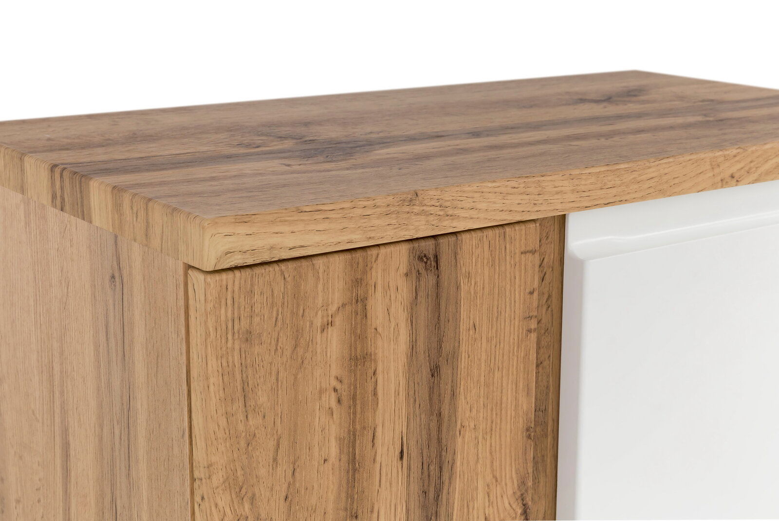 Nahaufnahme eines Unterschranks mit Holzoptik und weißer Front, Perspektive von oben.