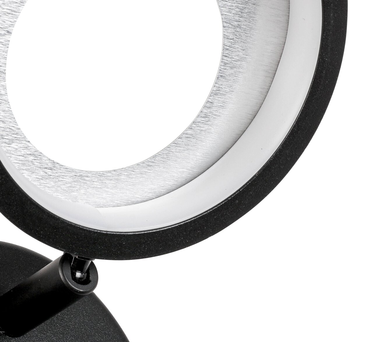 Nahaufnahme eines modernen LED-Strahlers mit schwarzem Rand und silberner Innenseite, seitliche Perspektive