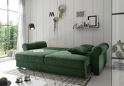 Grünes Funktionssofa in einem modernen Wohnzimmer, seitliche Perspektive