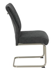 Seitenansicht eines grauen Schwingstuhls mit Metallgestell.