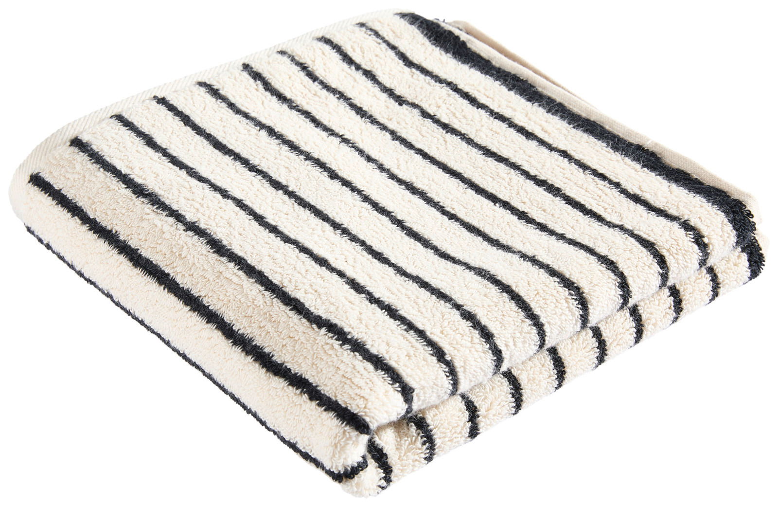 Gefaltetes Handtuch mit schwarzen Streifen auf cremefarbenem Hintergrund, von oben betrachtet.