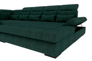 Großes dunkelgrünes Stoff-Schlafsofa mit hoher Rückenlehne, mehreren Kissen und ausklappbarer Armlehne/Seitenteil, gezeigt in schräger Vorderansicht von rechts.