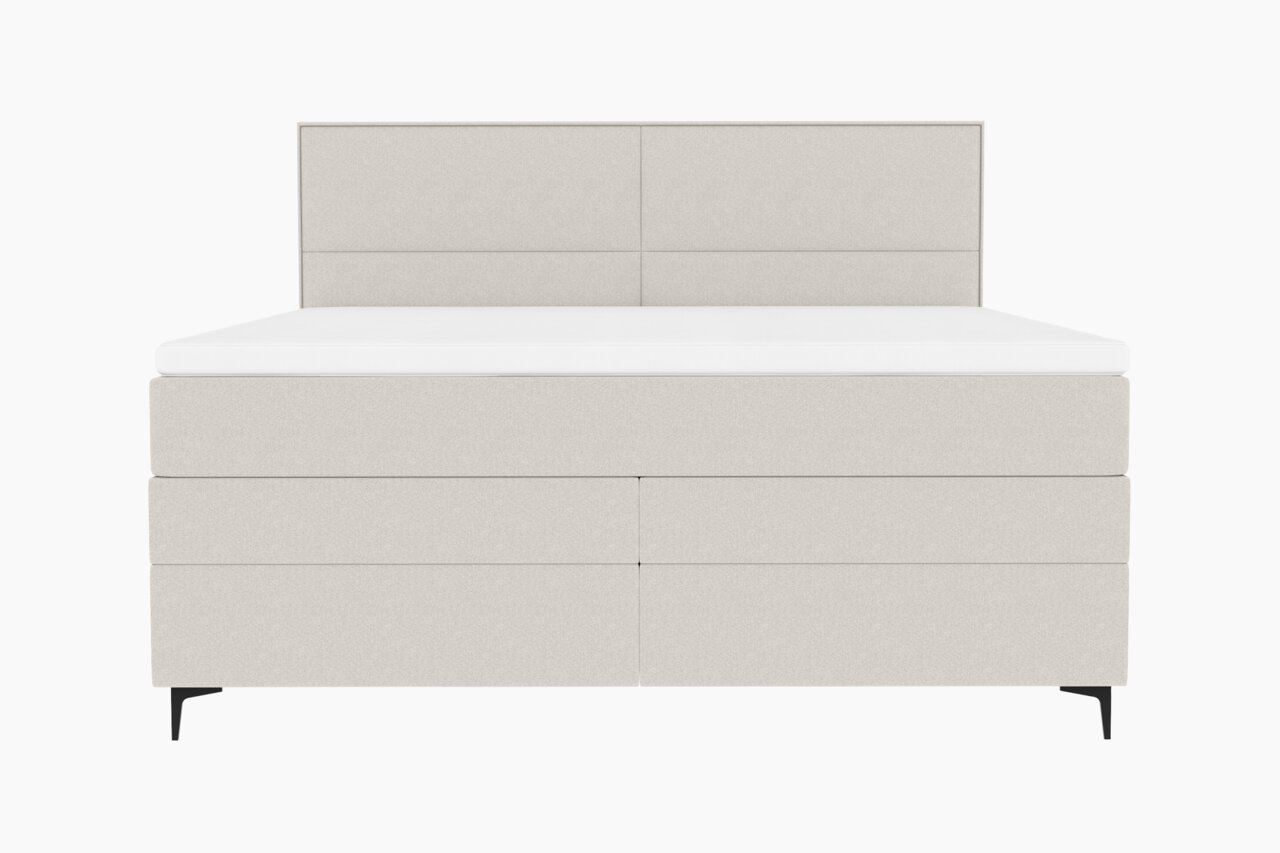Frontale Ansicht eines modernen Boxspringbetts in hellem Stoffbezug mit schlichtem Design und schwarzen Füßen.