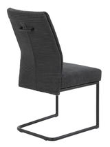 Rückansicht eines modernen Schwingstuhls DAGMAR mit grauem Stoffbezug und schwarzem Metallgestell.