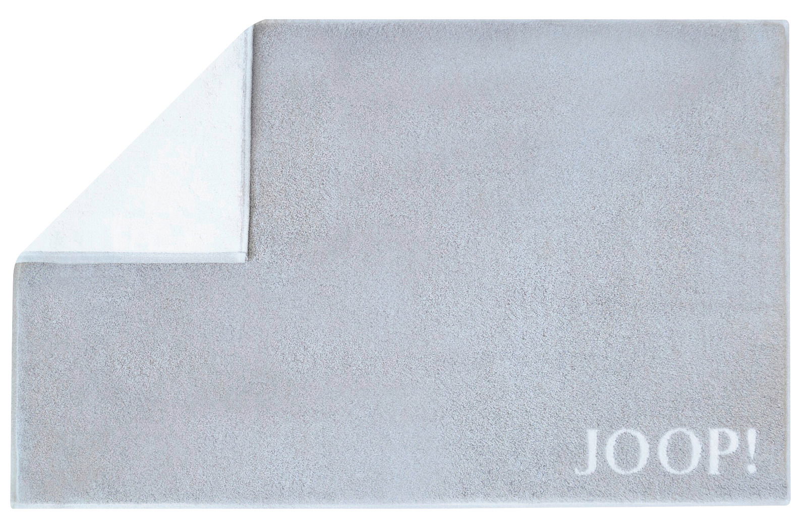 JOOP! Badmat DOUBLEFACE Graue Badematte mit umgeschlagener Ecke und dem Schriftzug 'JOOP!' in der unteren rechten Ecke, Draufsicht.