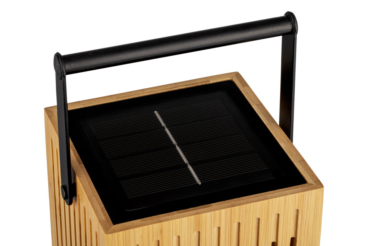 Solarlampe aus Holz mit schwarzem Griff und Solarpanel, Ansicht von oben