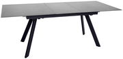 Moderner Esstisch mit grauer Tischplatte und schwarzen, schrägen Beinen, seitliche Perspektive