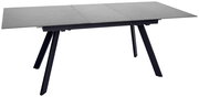 Moderner Esstisch mit grauer Tischplatte und schwarzen, schrägen Beinen, seitliche Perspektive