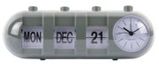 Tischuhr mit Kalenderfunktion, zeigt Montag, 21. Dezember an, mit analoger Uhr auf der rechten Seite, aus frontaler Perspektive.
