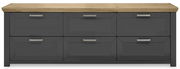 Frontansicht eines modernen Sideboards mit sechs Schubladen, grauer Korpus und Holzplatte.