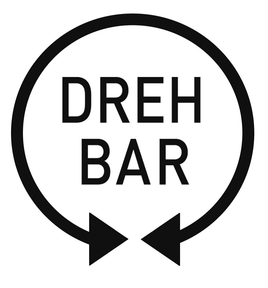 Symbol für drehbaren Sessel, schwarze Pfeile im Kreis mit der Aufschrift 'DREHBAR'.