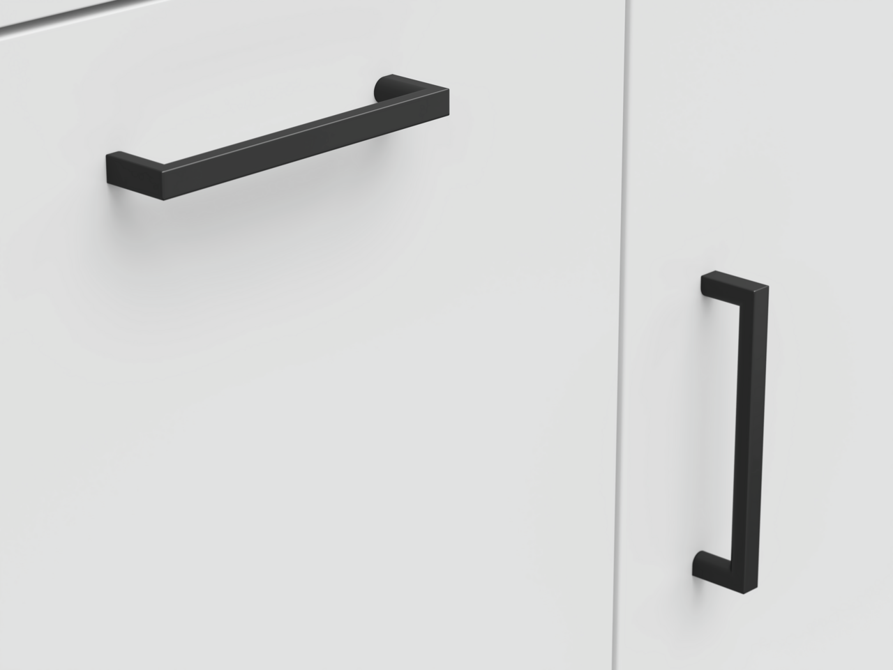 Carryhome Kommode MULTISTAURAUM Nahaufnahme von schwarzen Griffen an einer weißen Kommode, seitliche Perspektive