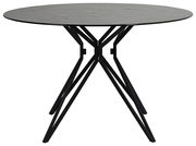 Runder Esstisch mit schwarzer Tischplatte und modernen, geometrischen Metallbeinen, seitliche Perspektive