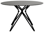 Runder Esstisch mit schwarzer Tischplatte und modernen, geometrischen Metallbeinen, seitliche Perspektive