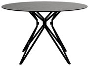 Runder Esstisch mit schwarzer Tischplatte und modernen, geometrischen Metallbeinen, seitliche Perspektive