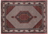 Orientteppich mit komplexem geometrischem Muster in Rot- und Beigetönen, Draufsicht
