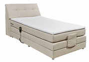 Beiges Boxspringbett mit verstellbarem Kopfteil und Fernbedienung, seitliche Perspektive