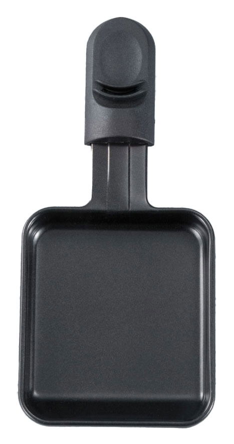 Raclette-Pfännchen aus schwarzem Material, von oben betrachtet.