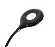 Schwarze LED-Klemmleuchte aus der Vogelperspektive mit rundem, modernem Design.