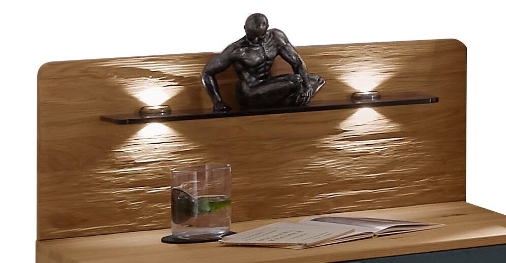 Nachtschrank-Paneel mit Holzoptik, integrierter Beleuchtung und dekorativer Skulptur, seitliche Perspektive