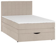 Beiges Boxspringbett mit gepolstertem, quadratisch abgestepptem Kopfteil und weißer Matratzenauflage, schräg von vorne links fotografiert