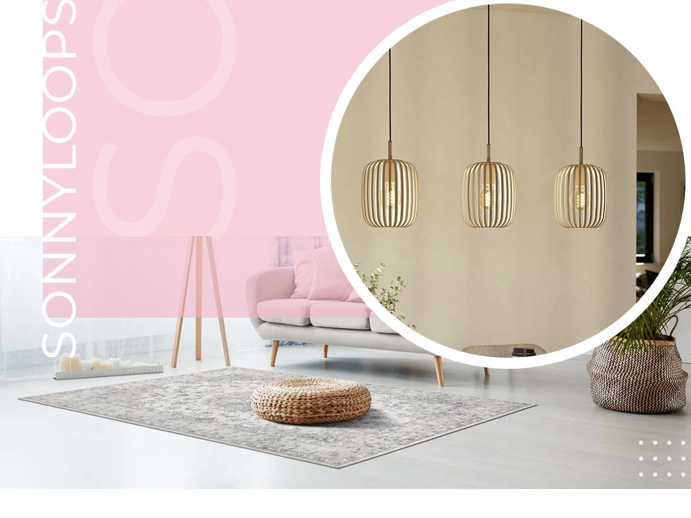 Moderne woonkamer met een roze bank, een houten lamp op drie poten en drie hanglampen.