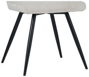 Moderner Hocker mit schwarzem Metallgestell und gepolsterter Sitzfläche in Seitenansicht