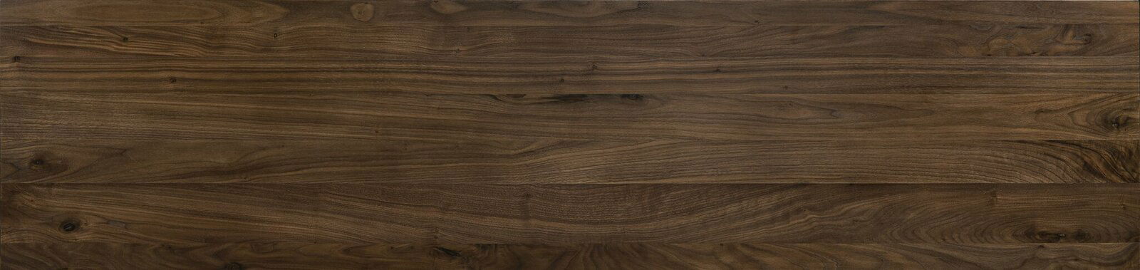 Draufsicht auf eine Holzoberfläche mit natürlicher Maserung, verwendet für ein Bettgestell.