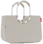 Beige Einkaufstasche mit stabilen, runden Griffen aus Aluminium, seitliche Ansicht