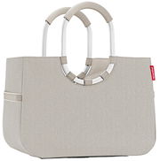 Beige Einkaufstasche mit stabilen, runden Griffen aus Aluminium, seitliche Ansicht