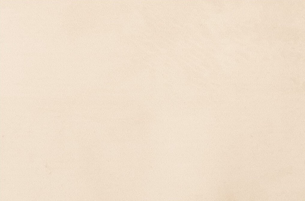 Nahaufnahme eines beigen Stoffes, möglicherweise für einen Drehsessel.