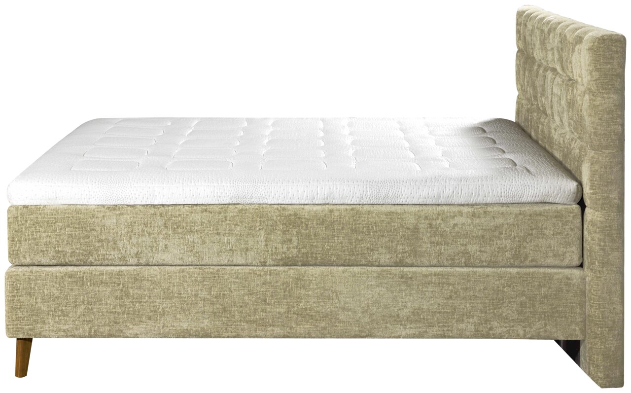 Esposa Boxspringbett TILA Seitenansicht eines Boxspringbetts 180x200 cm mit beigem Stoffbezug und gepolstertem Kopfteil.