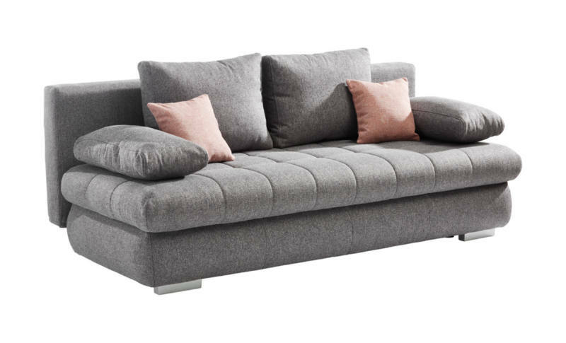 Graues Funktionssofa mit zwei rosa Kissen, seitliche Perspektive