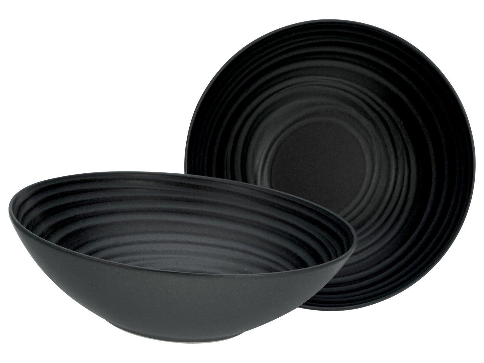 Creatable Salatschüssel 2-tlg LAVA STONE Schwarze, matte Servierschale mit konzentrischem Rillenmuster, leicht schräg von vorne aufgenommen, mit passendem Teller im Hintergrund in Frontalansicht