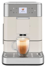 Vooraanzicht van een volautomatische koffiemachine met een kopje cappuccino onder de uitloop.