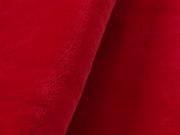 Nahaufnahme eines roten Fellteppichs mit weicher Textur.