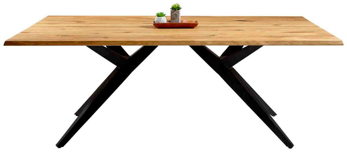 Moderner Esstisch mit Holzplatte und schwarzen Metallbeinen, seitliche Perspektive